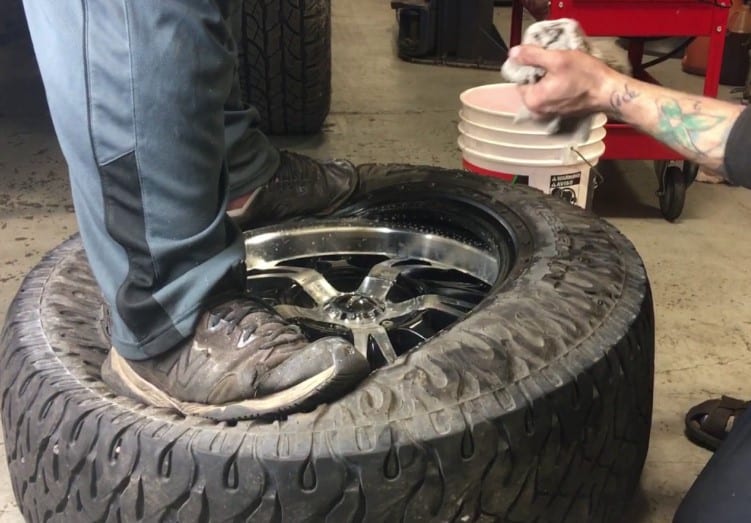 How to put a tire on a rim by hand
