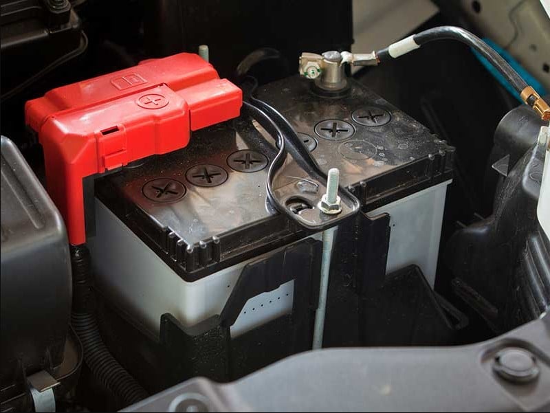 Can I charge my car battery without disconnecting it