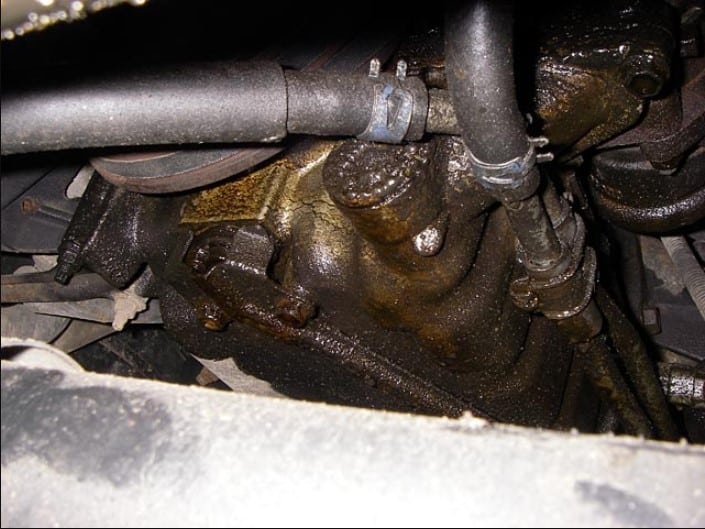 What causes an engine oil leak