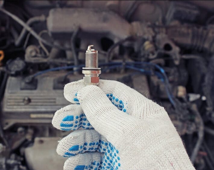 What are the benefits of replacing spark plugs